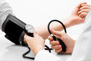 Blood pressure measuring studio shot